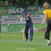 Jay Bista swings at a wide one from Overdijk