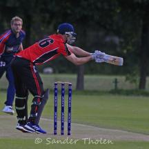 Cameron Burnett reaches for a wide one